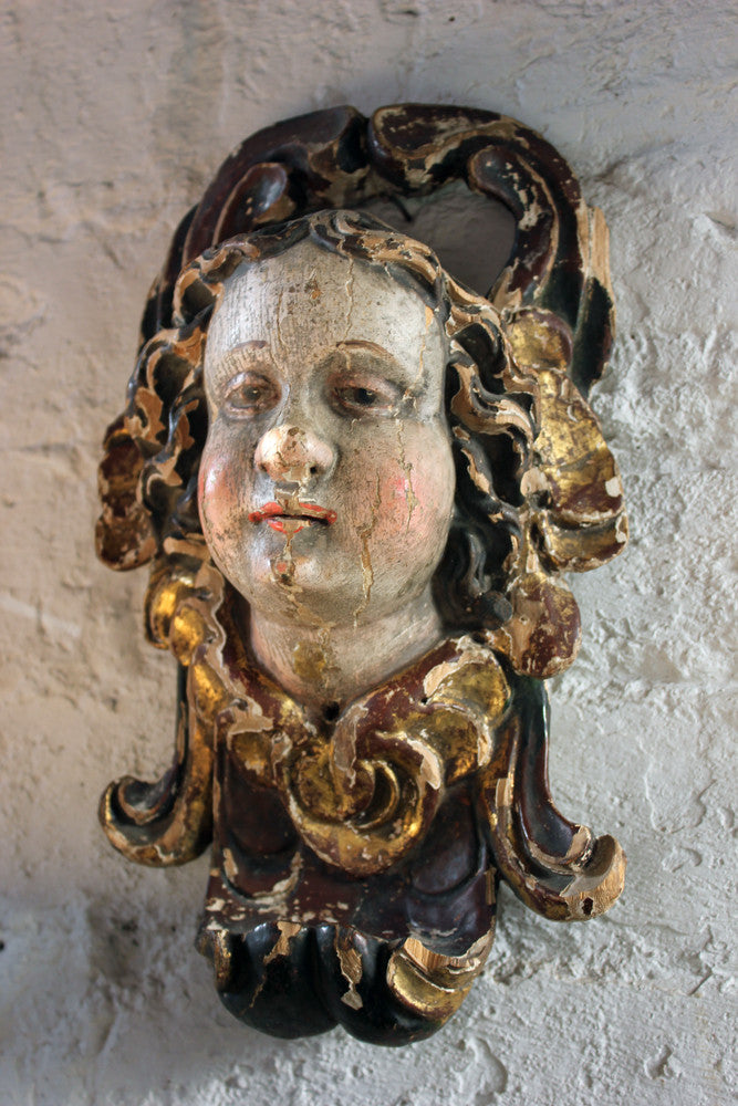 A Fine Early 18thC Polychrome Painted Cherub Head Mask