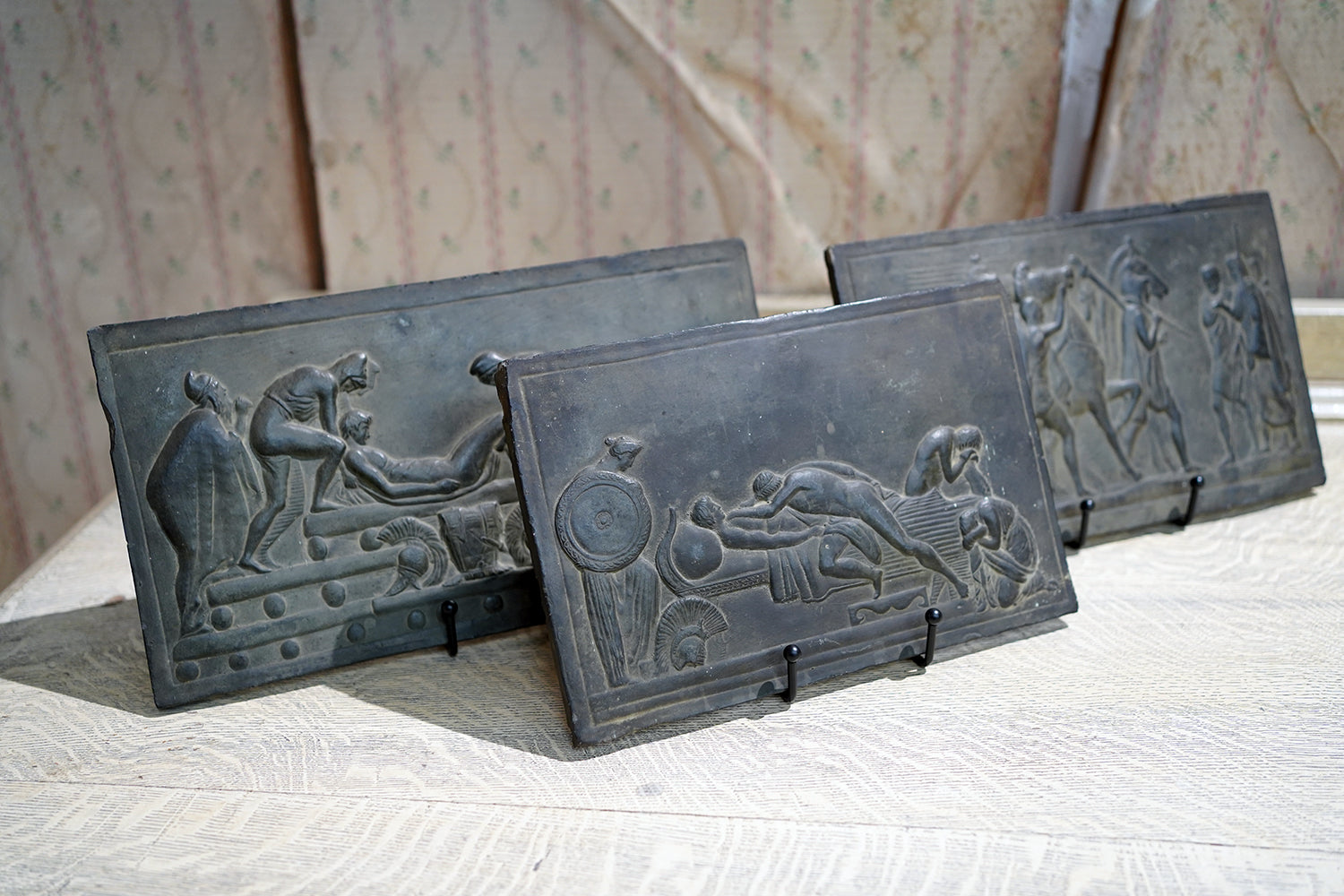 A Decorative Trio of Early 20thC Graduating Slate Plaques Depicting Classical Greek Scenes