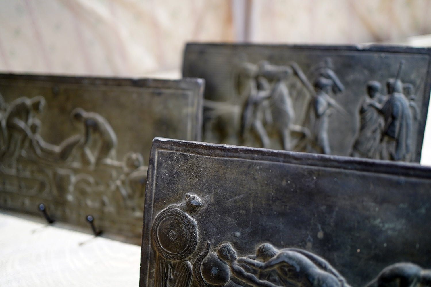 A Decorative Trio of Early 20thC Graduating Slate Plaques Depicting Classical Greek Scenes