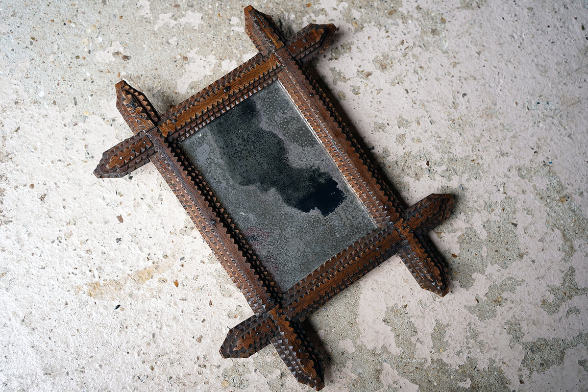 A c.1900 Stained Pine Tramp Art Wall Mirror