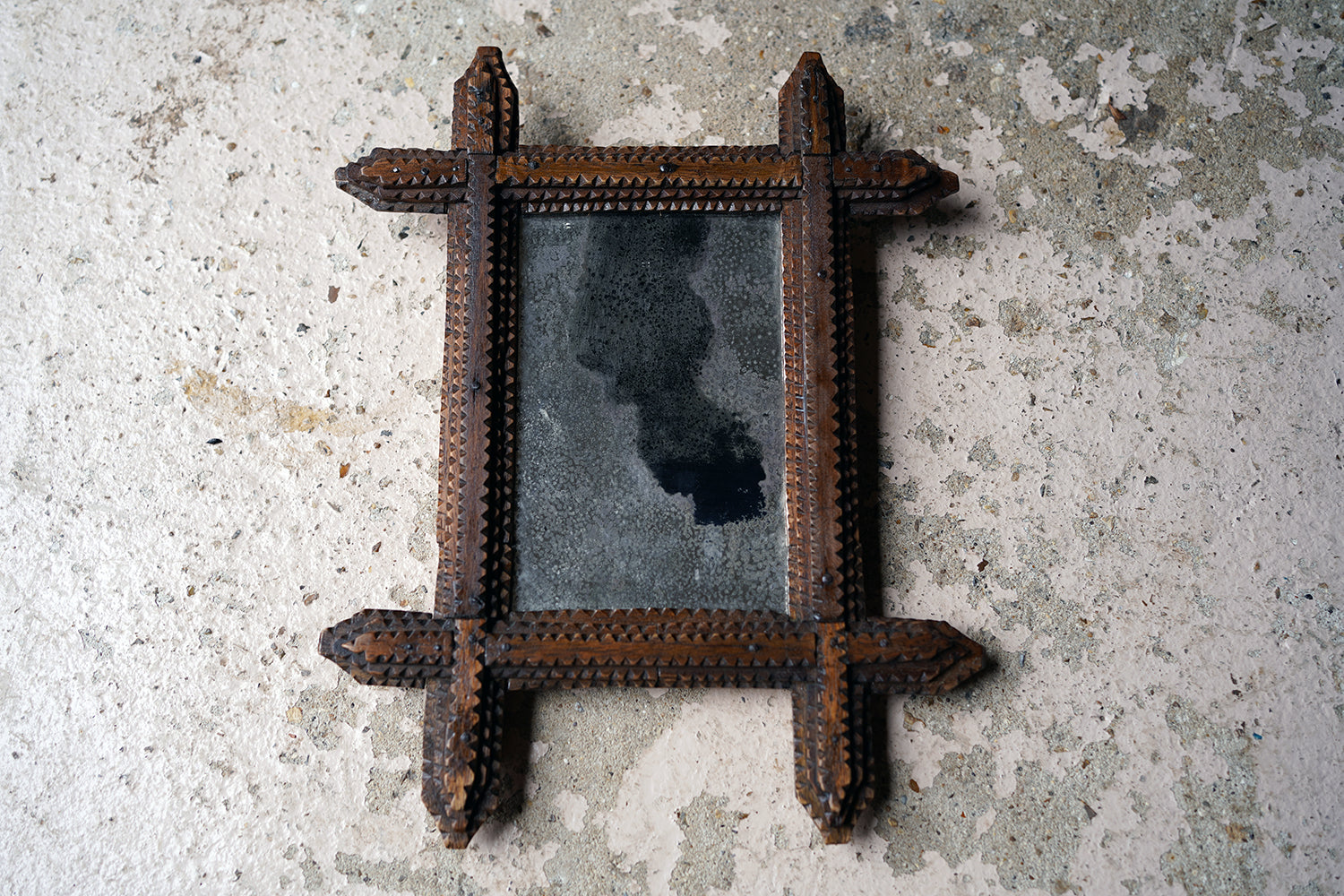 A c.1900 Stained Pine Tramp Art Wall Mirror