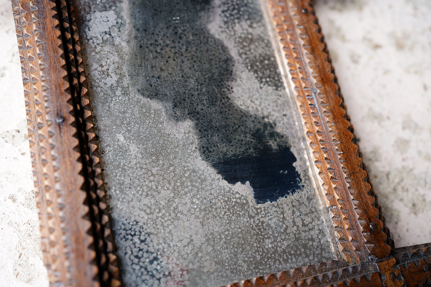 A c.1900 Stained Pine Tramp Art Wall Mirror